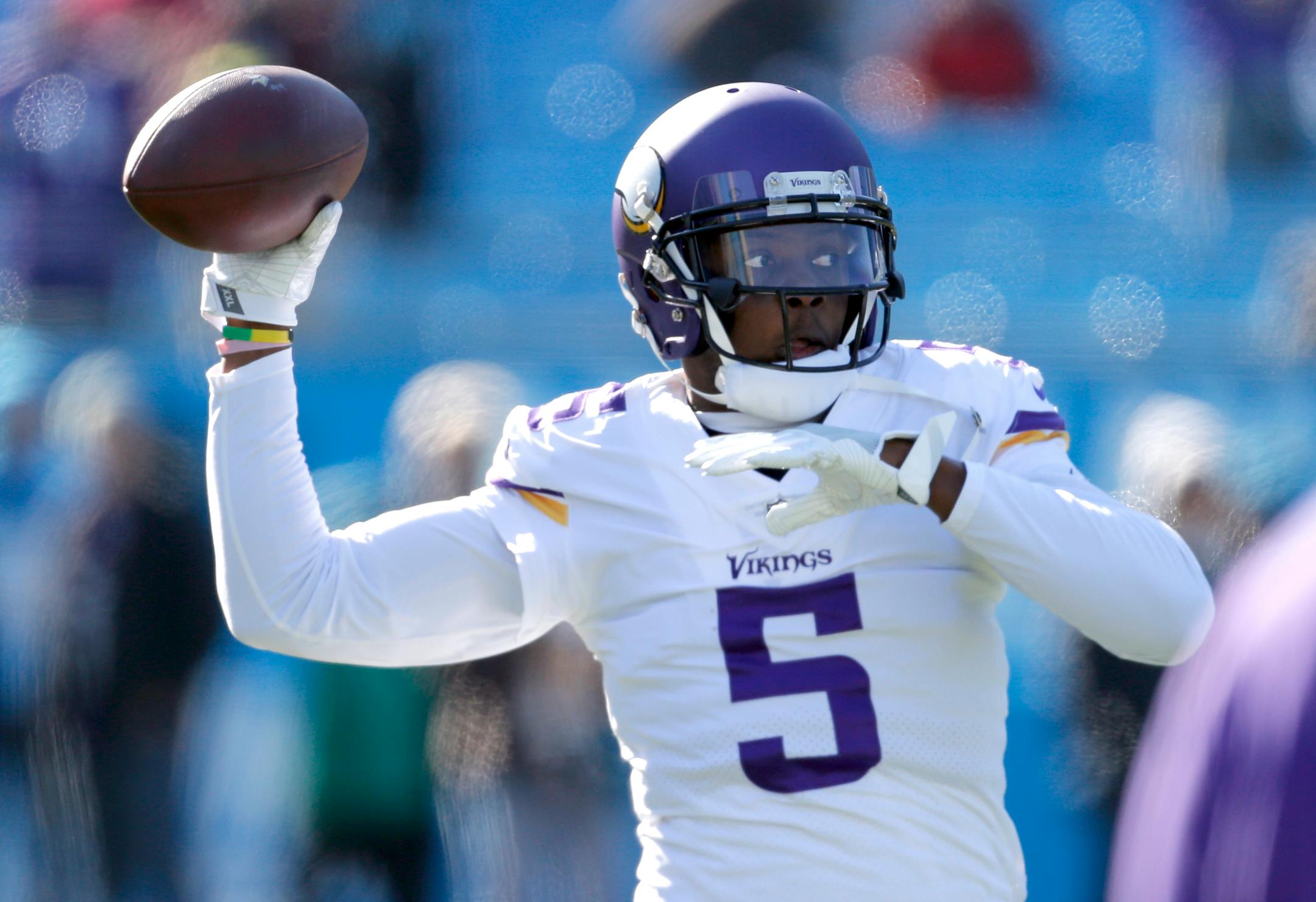 Minnesota Vikings' Teddy Bridgewater (5) warms up before an NFL football game against the Carolina Panthers in Charlotte, N.C., Sunday, Dec. 10, 2017. (AP Photo/Bob Leverone)
