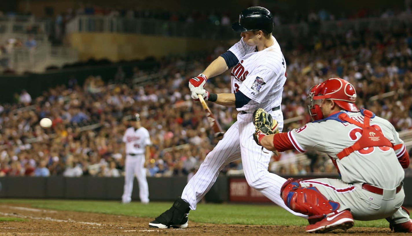 Justin Morneau drove in the game-winning run, scoring Jamey Carroll with an eighth-inning single Tuesday in a 3-2 victory over Philadelphia.