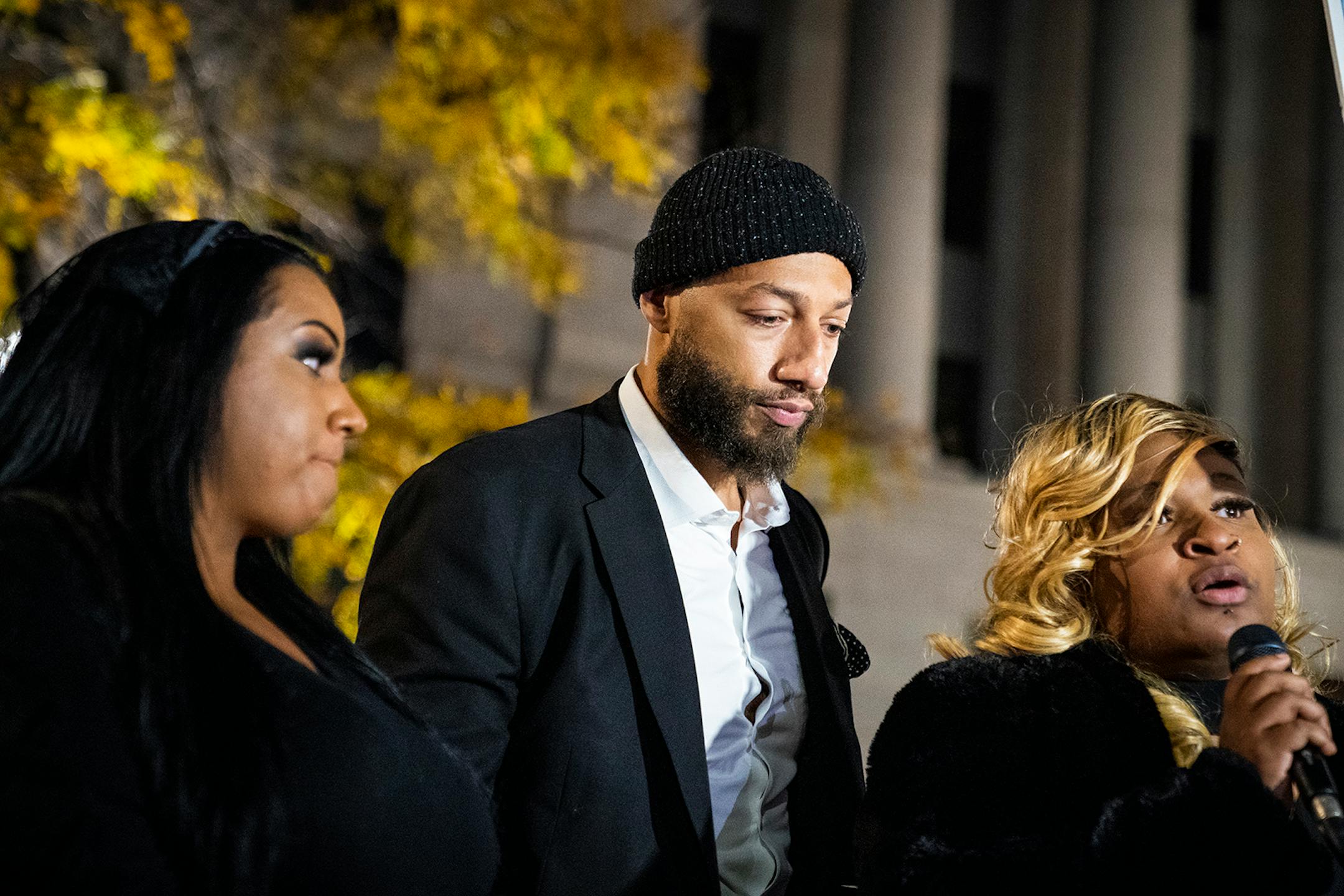 Royce White stood by the speakers, those who have lost loved ones to the police, during "The Secret March" in St. Paul.