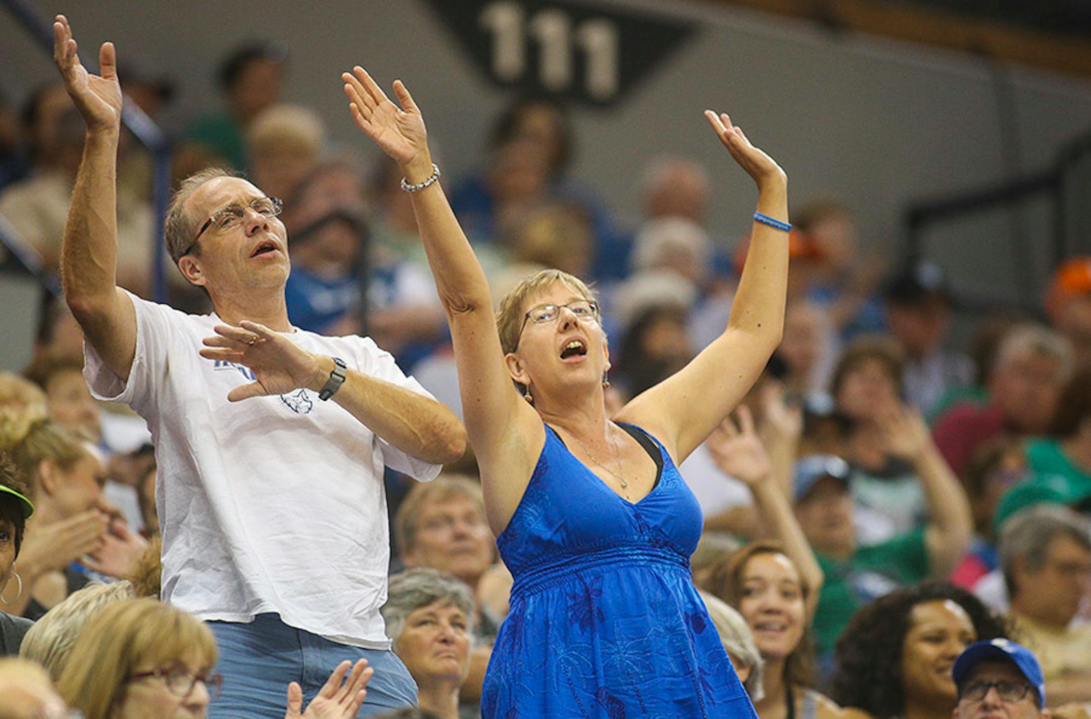 Fans sing along to Neil Diamond's "Sweet Caroline."