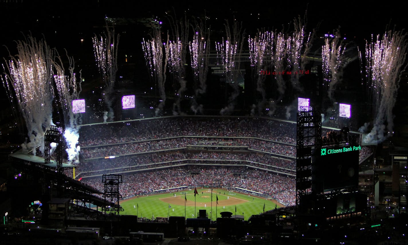 Fireworks explode over Citizens Bank Park in Philadelphia just before the start of Game 4 of the Major League Baseball World Series between the New York Yankees and Philadelphia Phillies on Sunday, Nov. 1, 2009. (AP Photo/Joseph Kaczmarek)