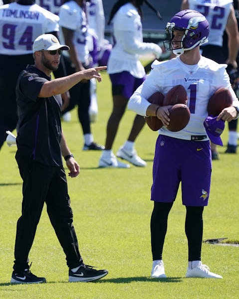 Minnesota Vikings kicker Greg Joseph (1) gathered balls for kicking practice during the first day of mandatory minicamp Tuesday in Eagan. ] ANTHONY SO