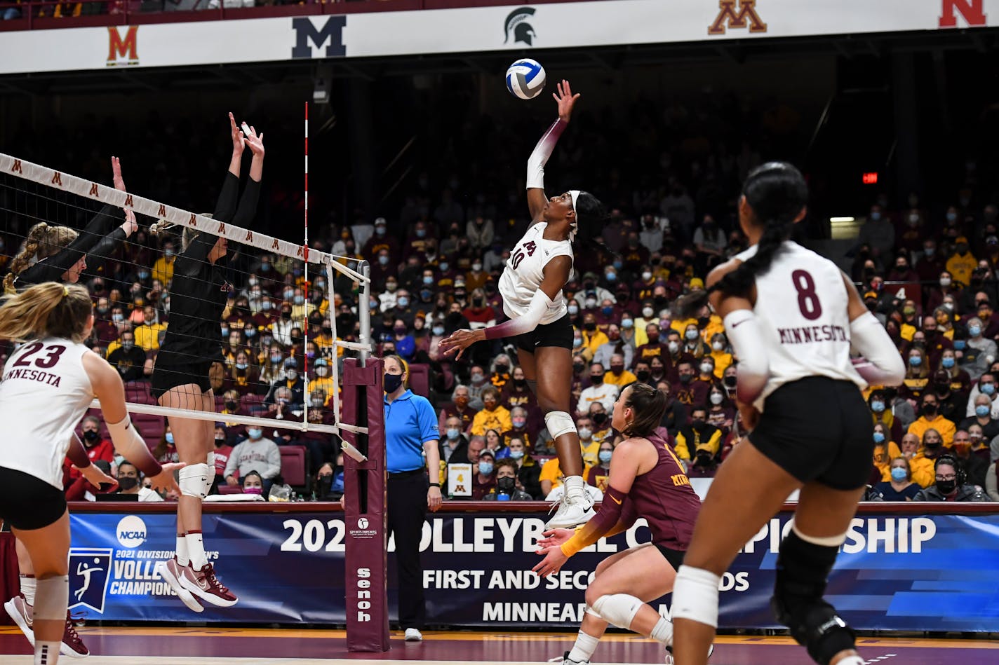 Gophers opposite Stephanie Samedy (10) leaps to spike the ball against Stanford during the first set Saturday, Dec. 4, 2021 at Maturi Pavilion in Minneapolis, Minn. The University of Minnesota Golden Gophers played the Stanford University Cardinal in the second round of the NCAA tournament. ] AARON LAVINSKY • aaron.lavinsky@startribune.com