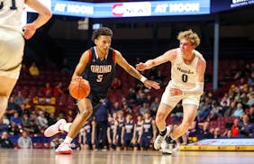 Isaiah Hagen worked his way past a defender during his 35-point game against Hermantown. 