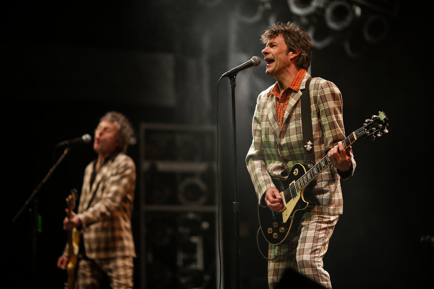 Tommy Stinson, left, and Paul Westerberg of The Replacements during their set at Midway Stadium Saturday evening. ] JEFF WHEELER • jeff.wheeler@startribune.com The Replacements reunion tour finally made a stop in their hometown Saturday night, September 13, 2014 at Midway Stadium in St. Paul.