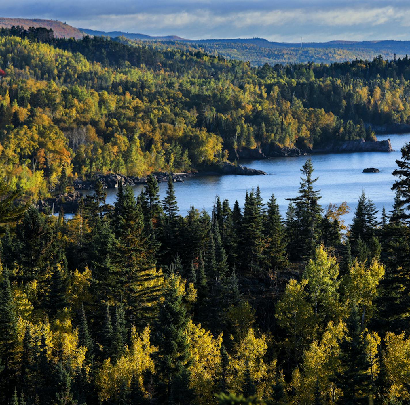 Northern Minnesota is the first to turn each fall and the mix of colors make for a spectacular show. The aspen, pine, maple and birch create a kaleidoscope of color that attract leaf watchers to travel backroads and fill hotel rooms and campgrounds on the north shore. The north shore at Tettegouche State Park is one of the most dramatic as the colors begin to turn. ] BRIAN PETERSON &#xa5; brian.peterson@startribune.com
North Shore, MN 10/05/2018