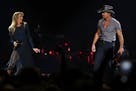 Country superstar couple Tim McGraw and Faith Hill performed together in St. Paul in August.