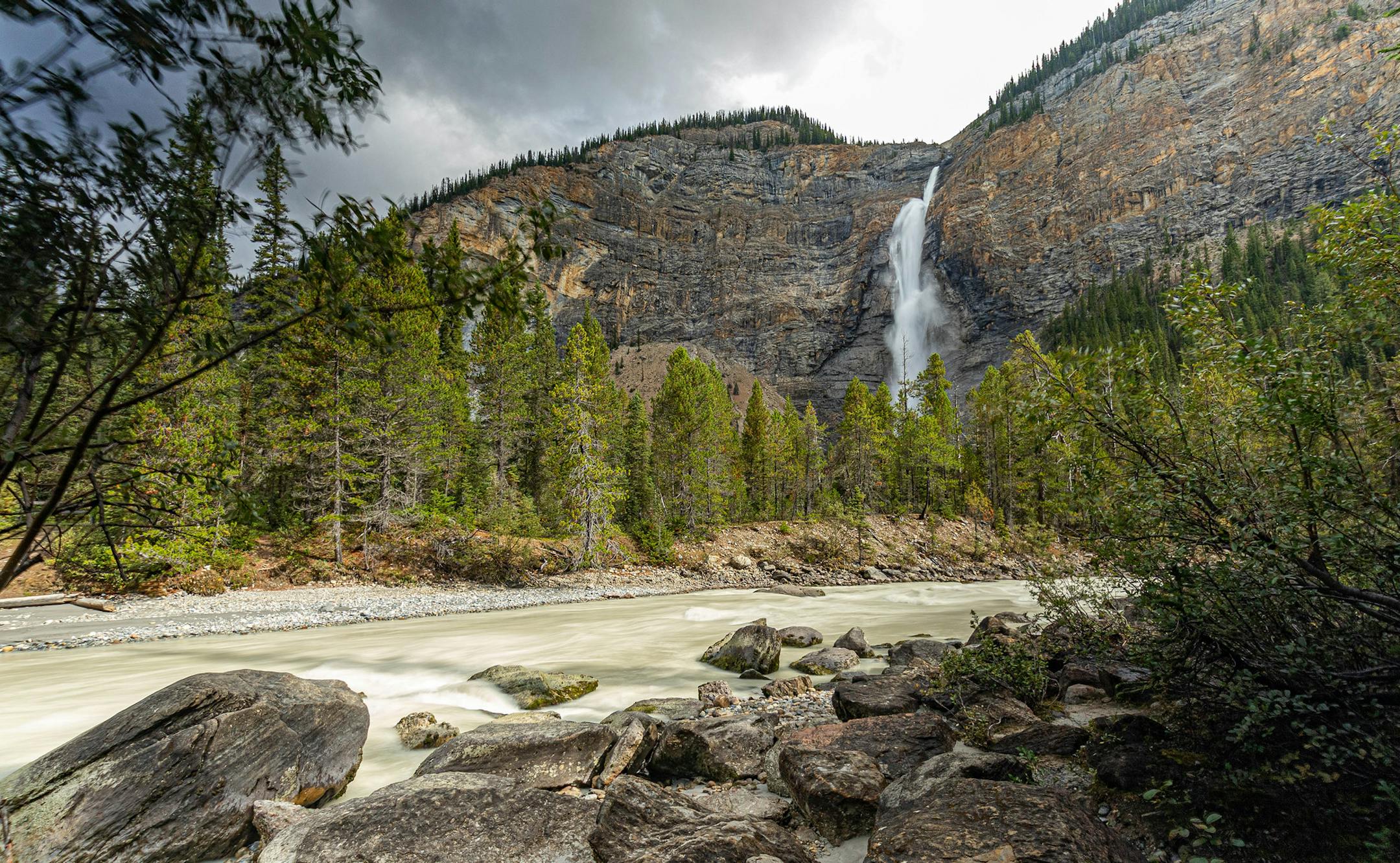 Lisa Novak, Plymouth MN Ph 763-300-6109 Photo was taken at Takakkaw Falls in Yoho National Park, British Columbia, Canada and shows the falls in the background with the Yoho River in the foreground. Canon EOS 7D Mark II with a Tamron 10-24 wide angle lens The Canadian Rockies are known for their majestic vistas so I wanted to capture the beauty of the falls within the grandeur of the surrounding landscape as my eye saw it and I thought it would be nice to capture the Yoho river and the rocks alo