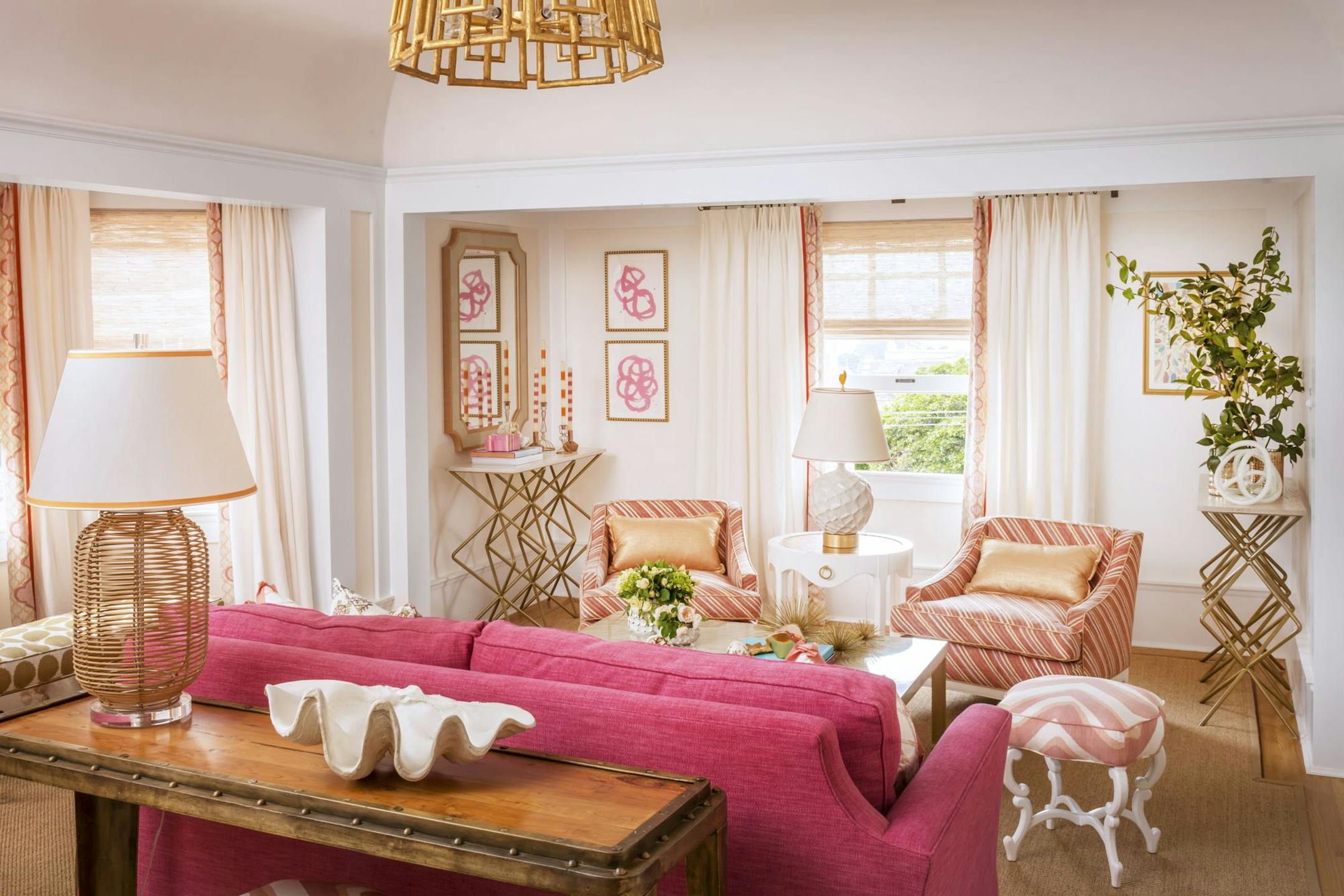 Living Coral color palette in a living room designed by Massucco Warner Miller.