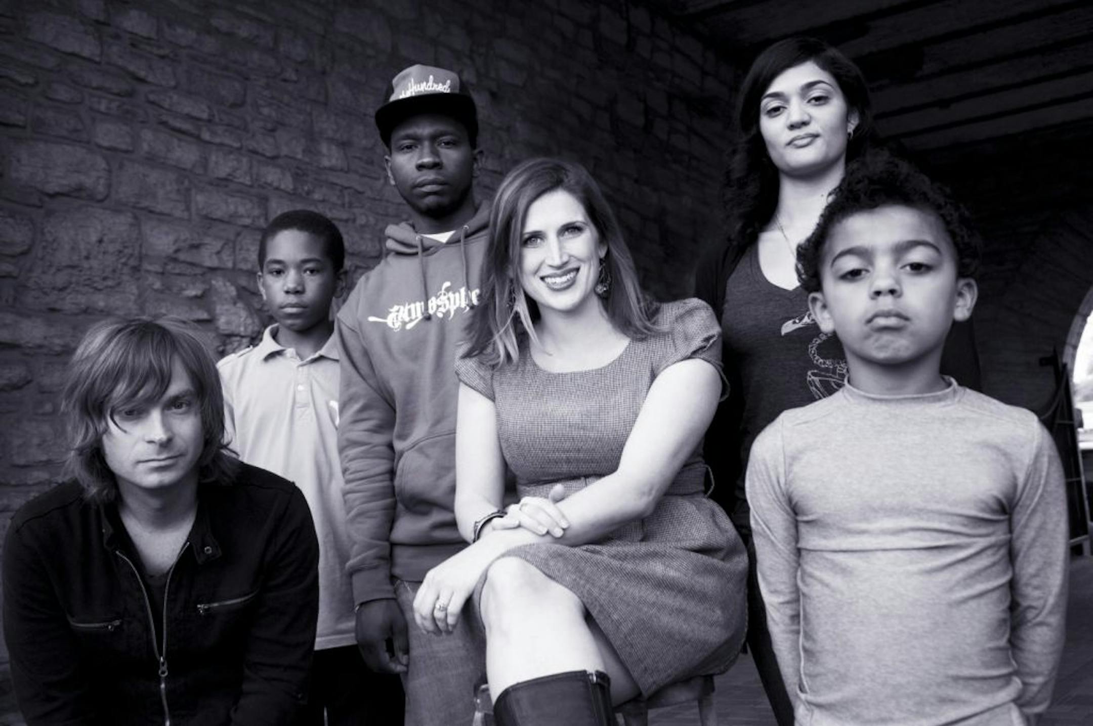 The Sounds like Home concert will feature Mally (rear left), Alison Scott (center), Villa Rosa (with Maria Isa, rear right) and the Melismatics (fronted by Ryan Smith, front left).