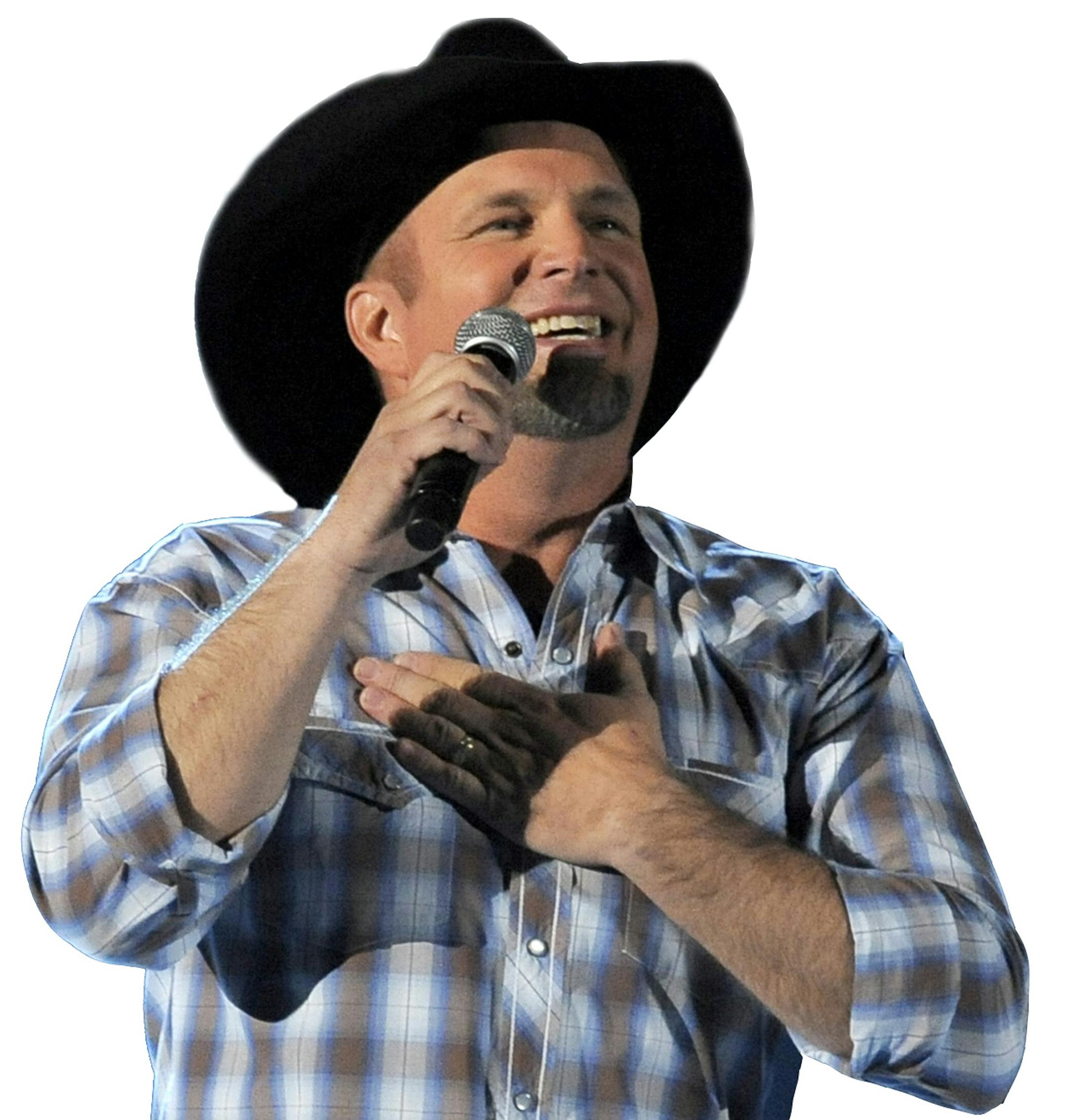 FILE - This April 7, 2013 file photo shows Garth Brooks performing at the 48th Annual Academy of Country Music Awards in Las Vegas, Nev. Brooks is a granddaddy. The country music superstar issued a statement Friday acknowledging the birth of his first grandchild, Karalynn. His daughter August gave birth earlier this week. (Photo by Chris Pizzello/Invision/AP, File) ORG XMIT: MIN2013112610442215
