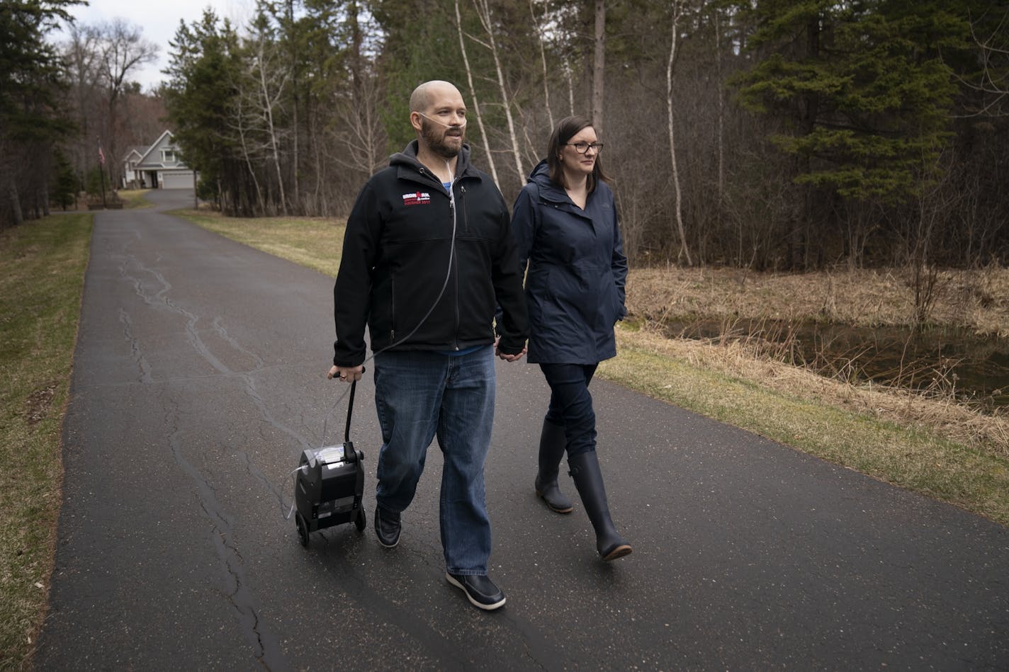 Anoka County resident Ben O'Donnell and his wife, Deanna, took their daily walk to get the mail on Friday, April 17, 2020. This was the first day O'Donnell was able to make it without a walker, however, he used an oxygen machine.