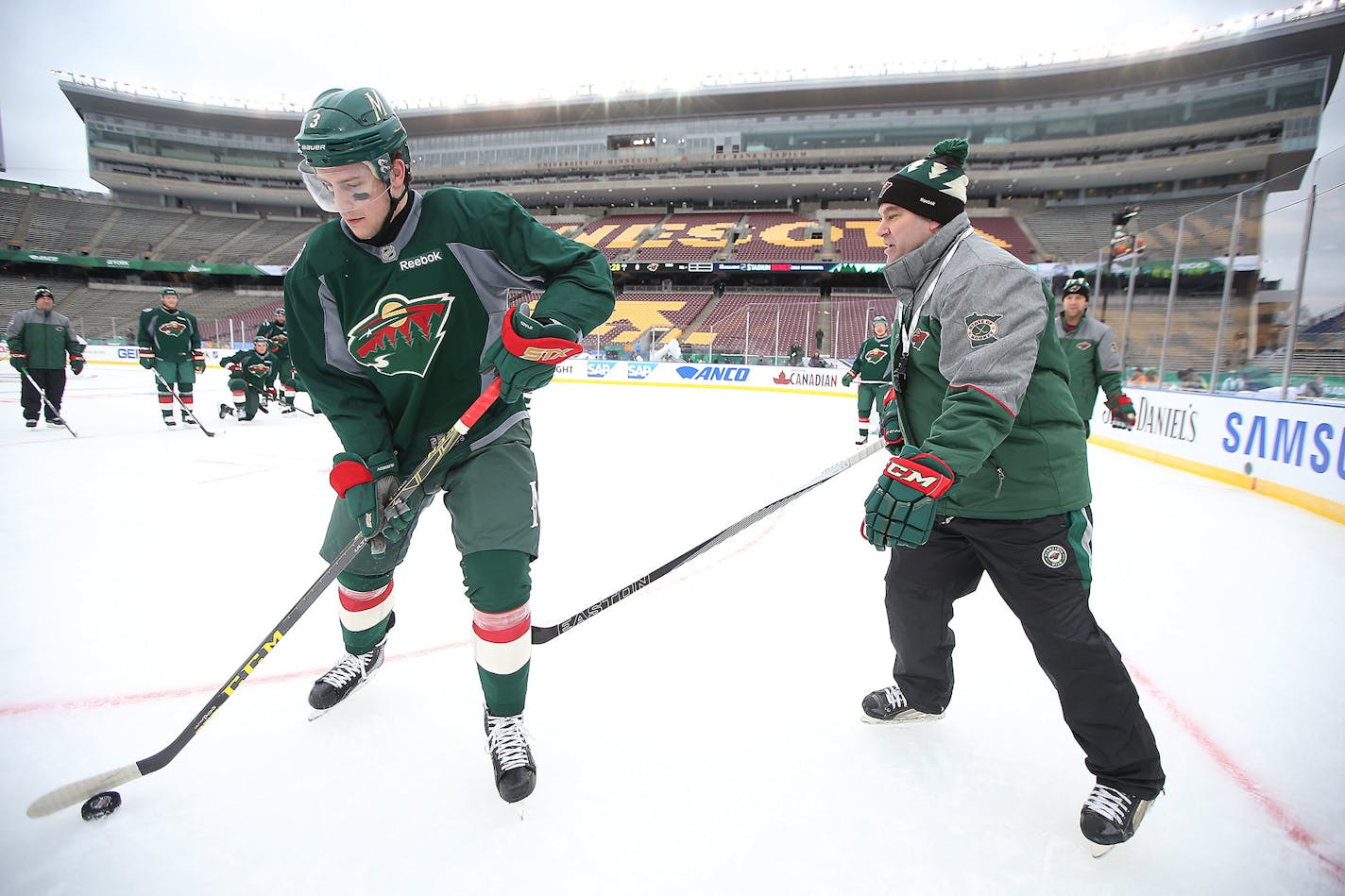 Minnesota Wild Head Coach John Torchetti took to the ice alongside Charlie Coyle for a practice before the 2016 Stadium Series Alumni game at TCF Bank Stadium, Saturday, February 20, 2016 in Minneapolis, MN. ] (ELIZABETH FLORES/STAR TRIBUNE) ELIZABETH FLORES � eflores@startribune.com