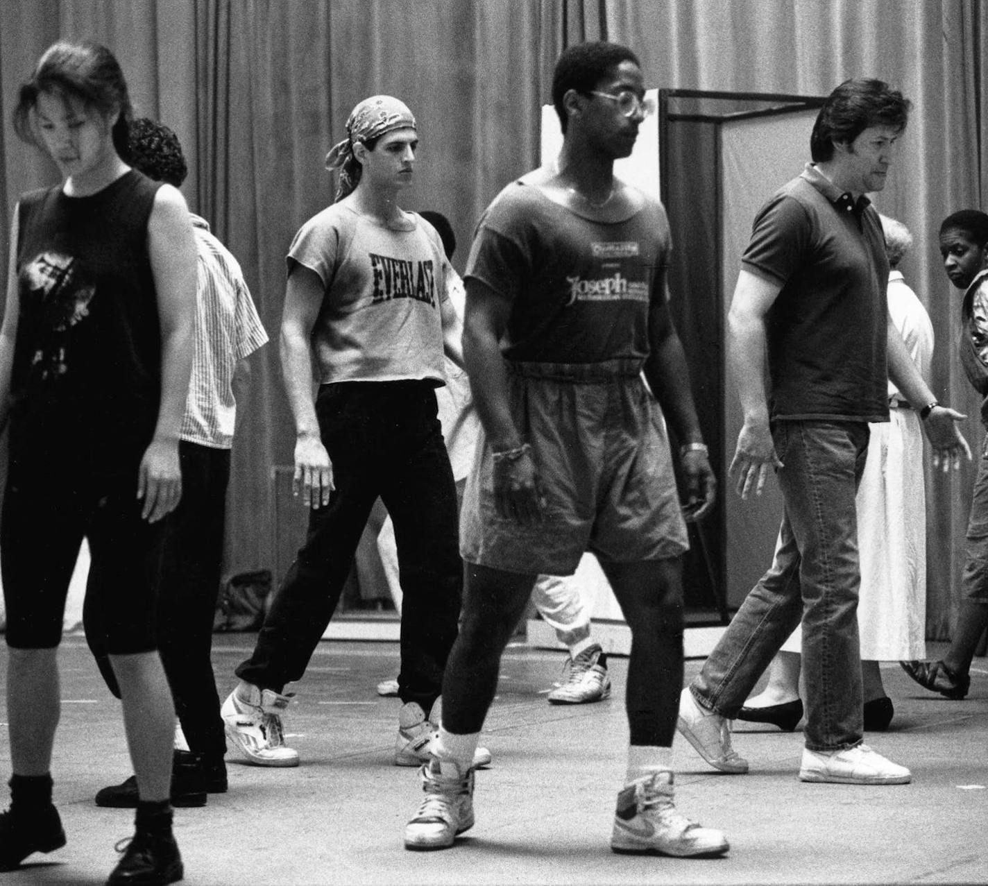 Joseph Haj (center left, in Everlast shirt) rehearsed at the Guthrie in 1990 with castmates for a production of "The Skin of Our Teeth." ORG XMIT: P6YGJm8dEfsxgIDw_DqY