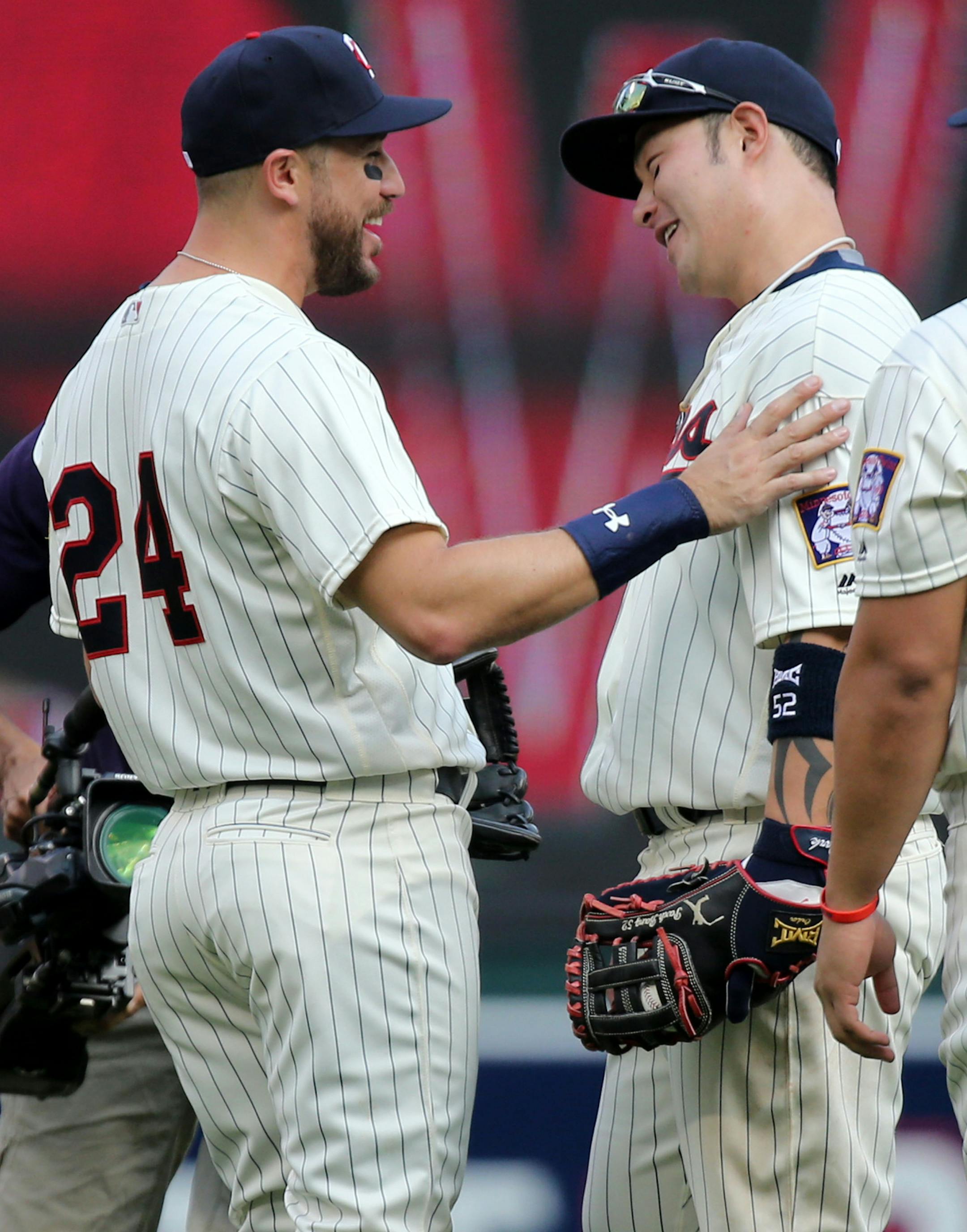 The Minnesota Twins Trevor Plouffe (24) and Byung Ho Park, two of the game's big hitters, celebrate after Minnesota beat Los Angeles Angels 6-4 Saturday, April 16, 2016, at Target Field in Minneapolis, MN.](DAVID JOLES/STARTRIBUNE)djoles@startribune.com Minnesota Twins vs Los Angeles Angels