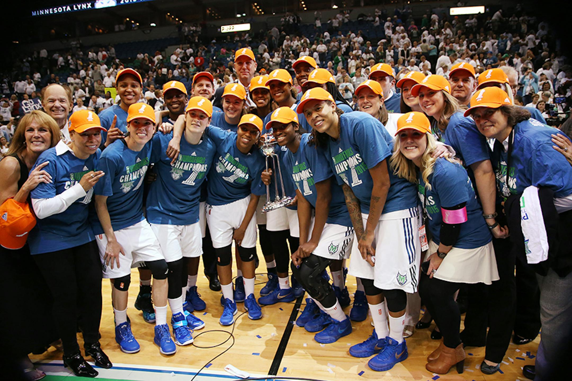 The Minnesota Lynx pose for photos after winning the WNBA title.