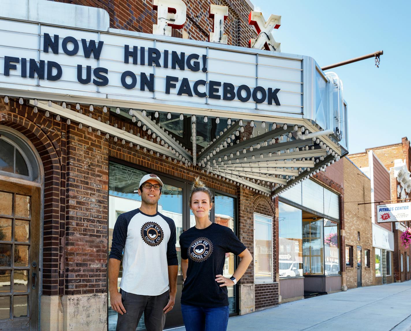 Dr. Karlyn Armbruster, right, and her husband, Dr. Adam Arbruster, not pictured, bought the old Pix Theater and are redeveloping it as a coffee shop and brew pub. David Forster, left, a former newspaper reporter and public relations officer, will manage the business with his wife, Samarah Forster. Armbruster and Forster are emblematic of the young professionals moving to Sleepy Eye and say they're optimistic the town will recover from the loss of the Del Monte cannery.