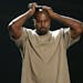Kanye West reacts as he accepts the video vanguard award at the MTV Video Music Awards at the Microsoft Theater on Sunday, Aug. 30, 2015, in Los Angel