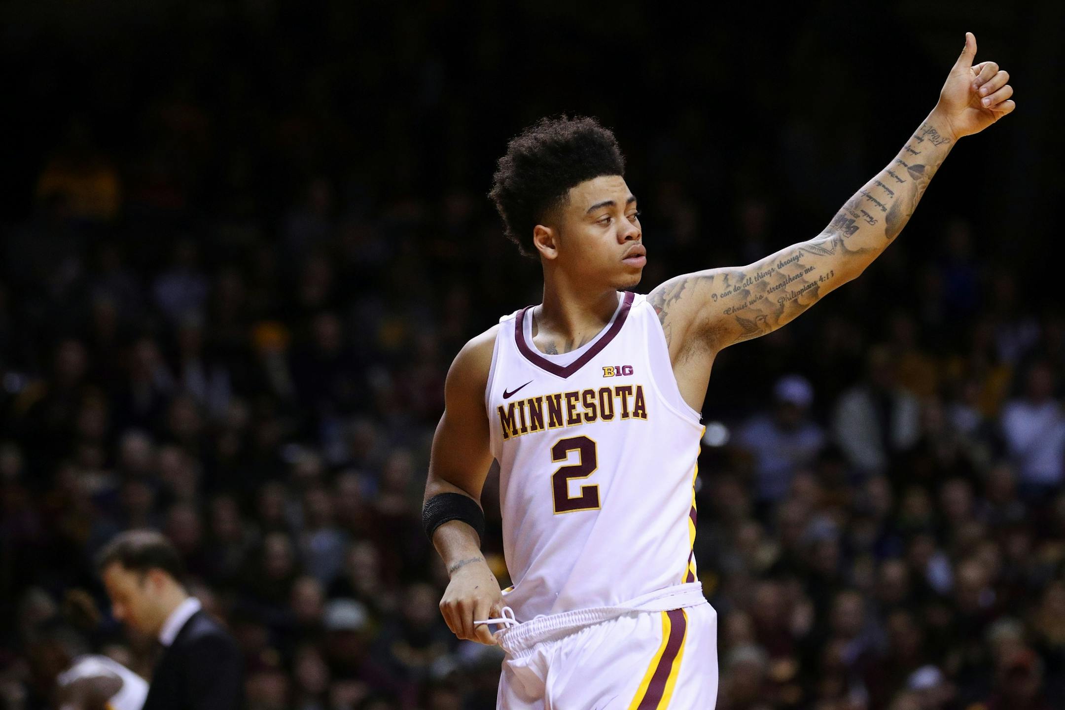 Minnesota Golden Gophers guard Nate Mason (2) gestures to his teammates after entering the game during the first half.