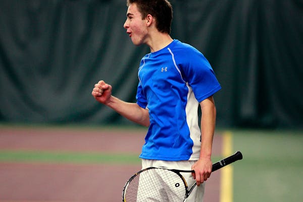 Joey Richards of Minnetonka celebrates after defeating Toby Boyer of Forest Lake to win the Class 2A individual tennis final