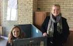 Anne Lippin, left, and Heidi Ritter, volunteers and board members of Steeple People, with equipment in the new space they found for the nonprofit thri