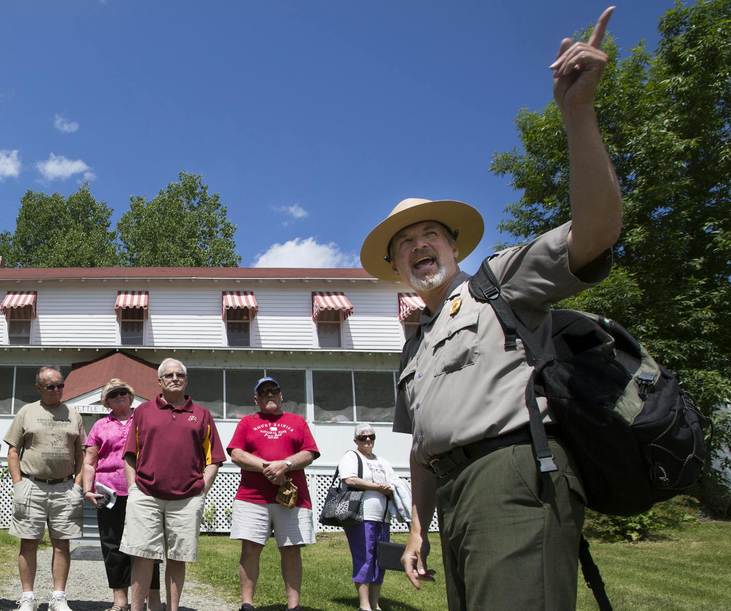 Kevin Nelson, right, an interpretive park ranger, leads a tour group at the Kettle Falls Hotel. ] (Leila Navidi/Star Tribune) leila.navidi@startribune.com BACKGROUND INFORMATION: Voyageurs National Park in Minnesota on Friday, June 24, 2016.