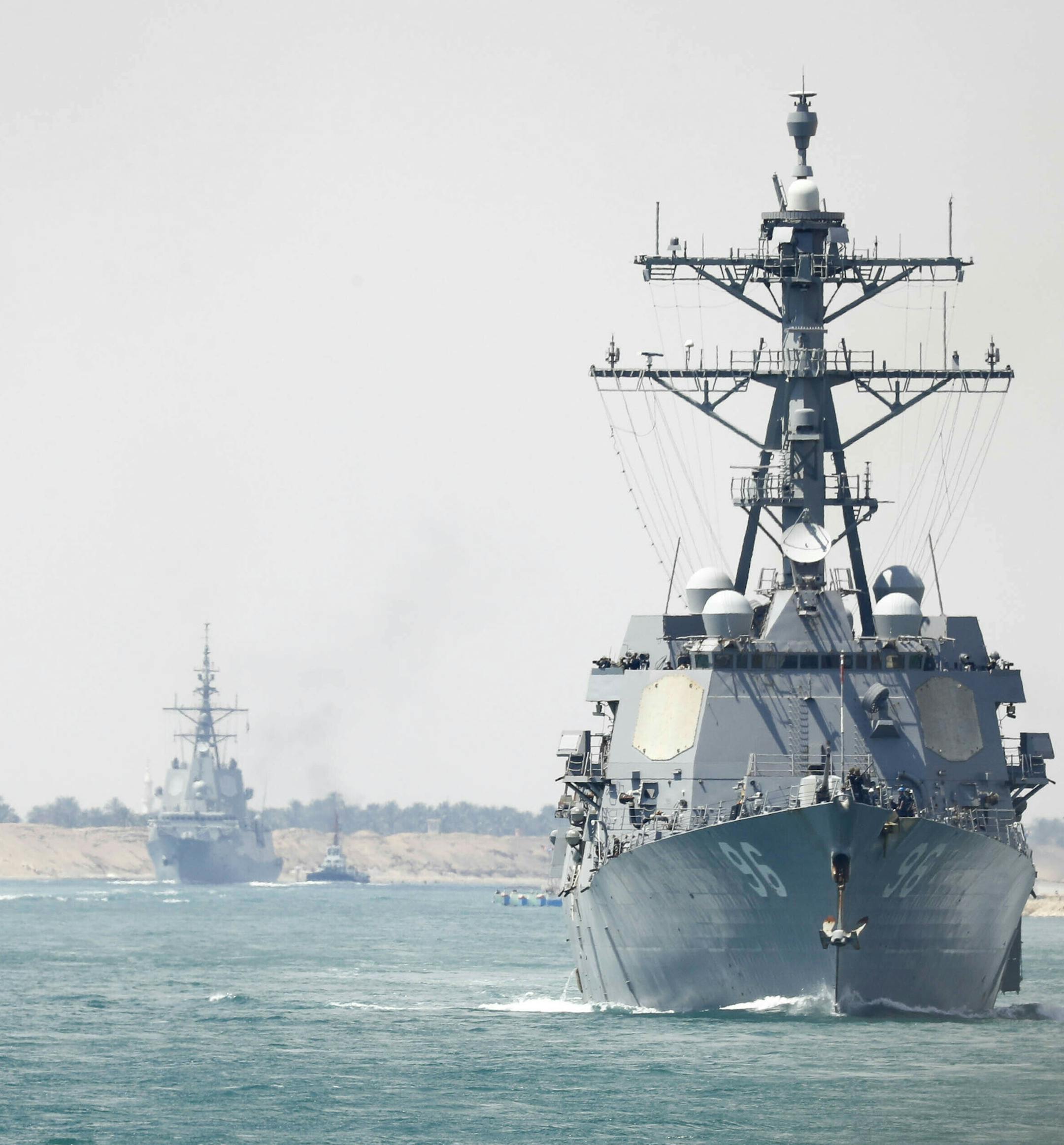 In this Thursday, May 9, 2019 photo released by the U.S. Navy, the Abraham Lincoln Carrier Strike Group transits the Suez Canal in Egypt. The aircraft carrier and its strike group are deploying to the Persian Gulf on orders from the White House to respond to an unspecified threat from Iran. (Mass Communication Specialist 3rd Class Darion Chanelle Triplett/U.S. Navy via AP) ORG XMIT: ARE106