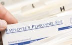 iStock
Pulling an employee's personnel file.