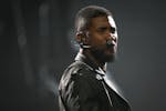 Usher performs at Xcel Energy Center Tuesday, Nov. 18, 2014.