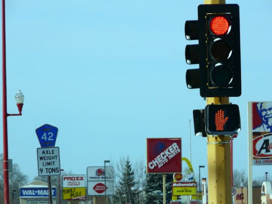 Numerous stoplights slow traffic on County Road 42 as it passes through the southern suburbs.