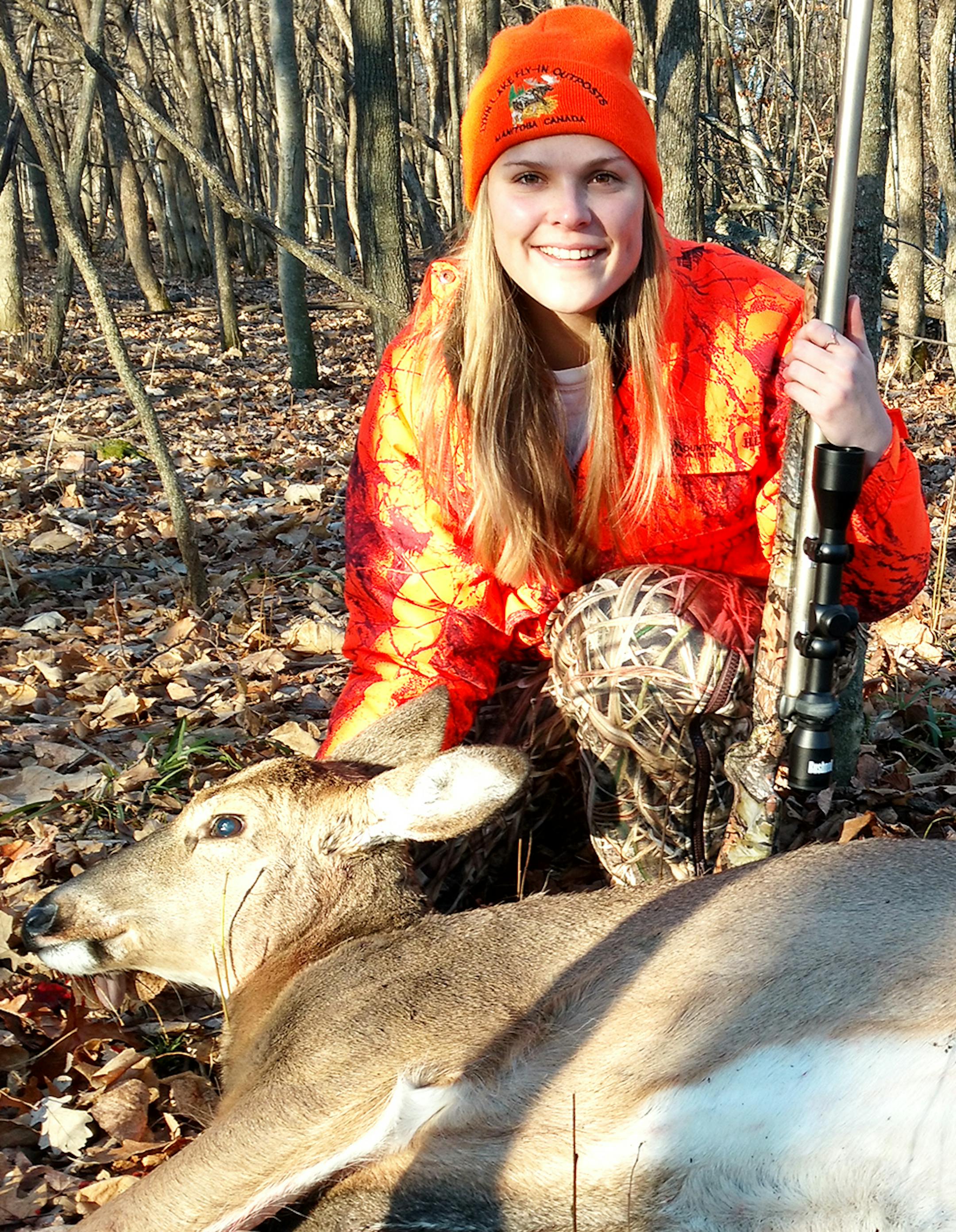 University of Minnesota-Duluth student Jenna Bettschen, 19, of Long Prairie, hunted during the Minnesota muzzleloader season this year. She shot this 200-pound doe during the Thanksgiving holiday break.
(Photo submitted by Lori Bettschen)