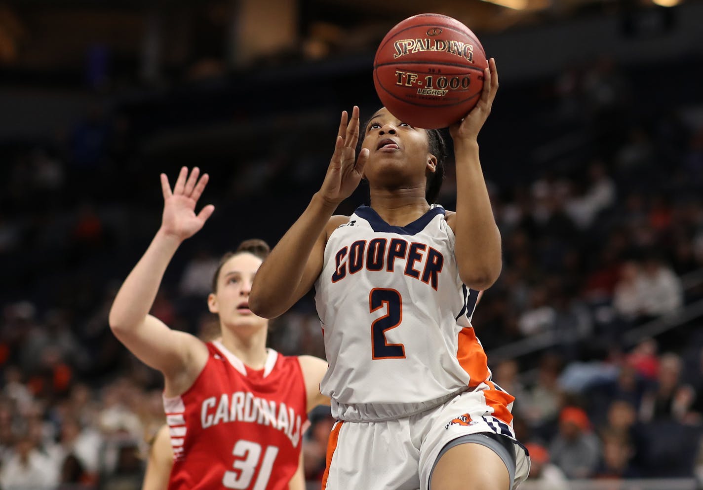 Hawks Aja Wheeler scored over Hannah Johnson during girls class 3A semifinals action at Target Center Thursday March 15, 2018 in Minneapolis, MN.] The Robbinsdale Cooper Hawks played Willmar Cardinals. JERRY HOLT &#xef; jerry.holt@startribune.com