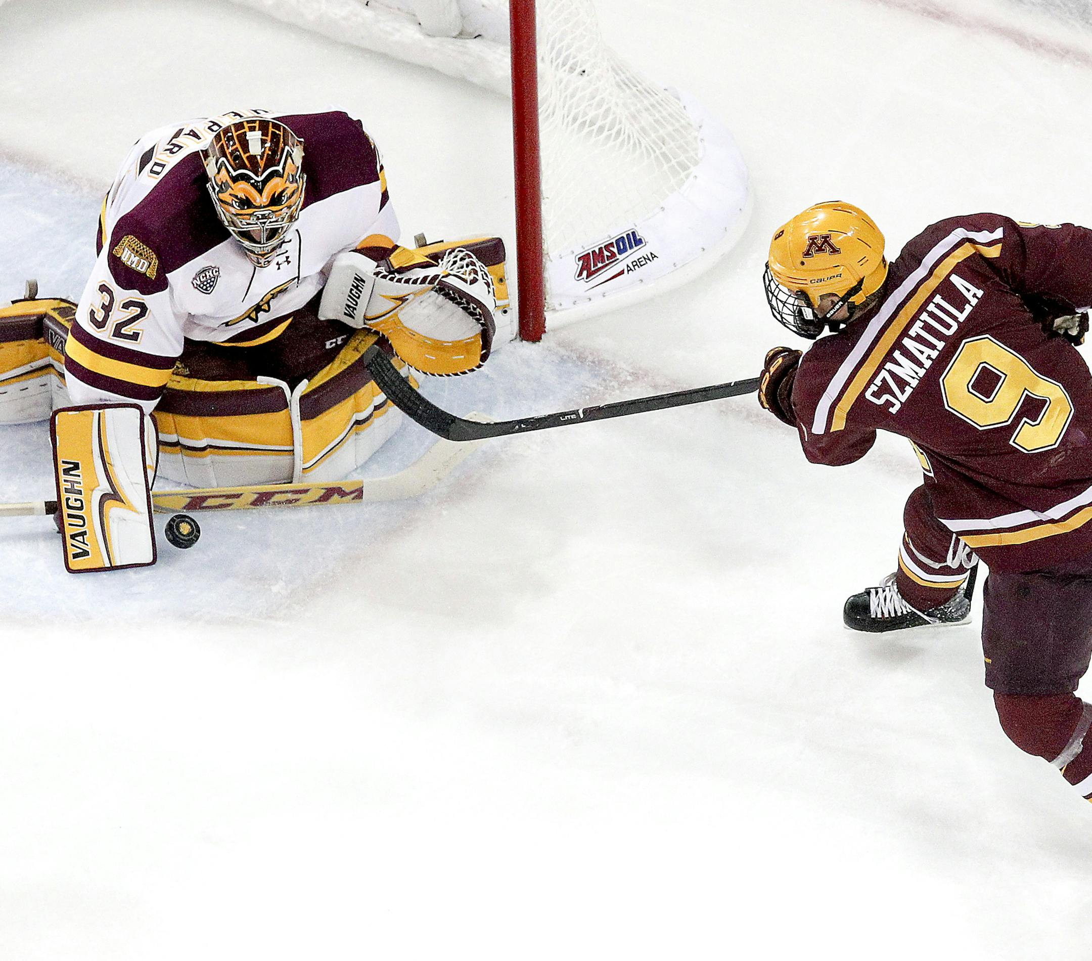 t092717 --- Clint Austin --- 100717.S.DNT.UMDPUX.C03 --- Minnesota Duluth goaltender Hunter Shepard (32) blocks a shot from Mike Szmatula (9) of Minnesota during the Ice Breaker Tournament at Amsoil Arena in Duluth, Minn. Friday Oct. 6, 2017 (Clint Austin / caustin@duluthnews.com)