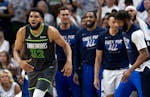 Timberwolves center Karl-Anthony Towns (32) is frustrated by a call on Thursday night at Target Center.