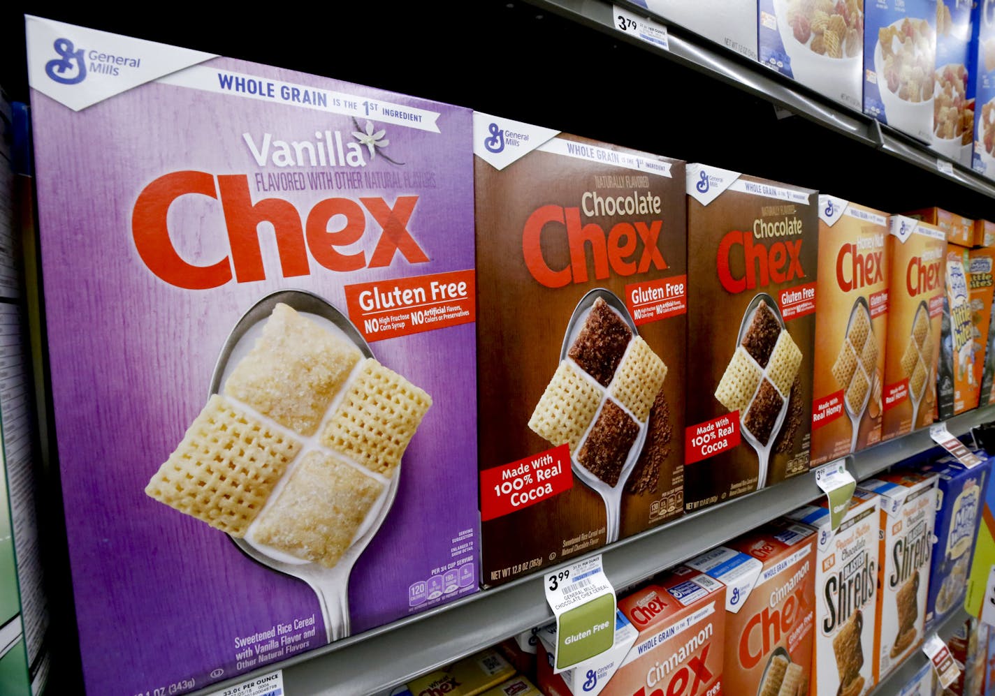 Boxes of General Mills Chex cereal sit on display in a market in Pittsburgh, Wednesday, Aug. 8, 2018. (AP Photo/Gene J. Puskar) ORG XMIT: PAGP ORG XMIT: MIN1909171559252666