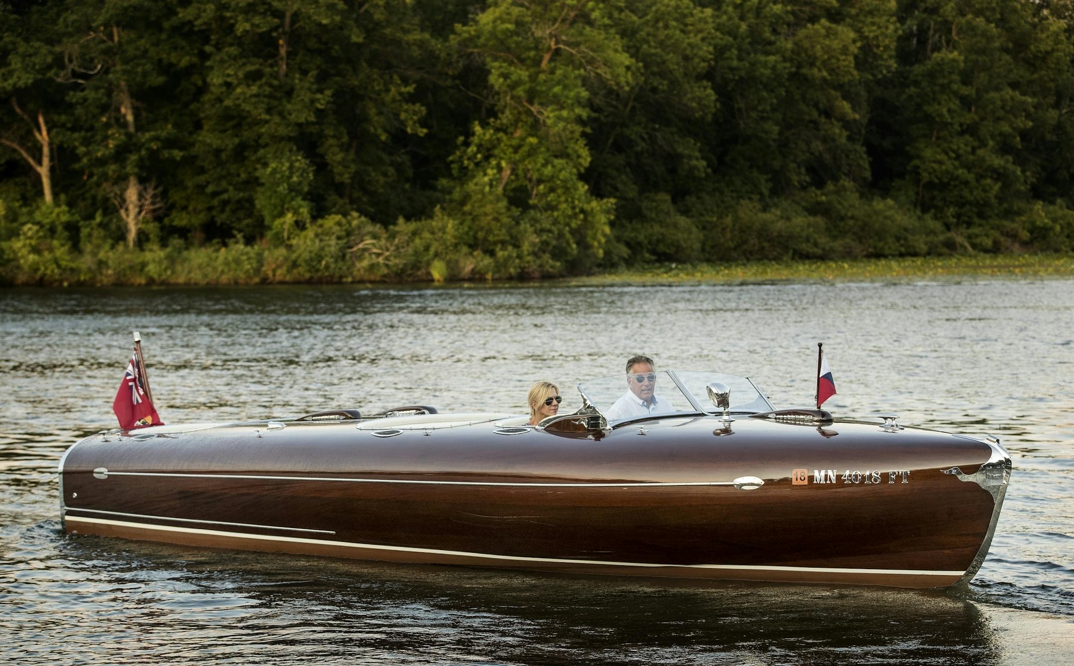 John and Becky Allen in Pocahontas. Pocahontas is a 1955 26-foot triple cockpit Canadian Greavette Streamliner powered by a 1955 V8 Hemi. Built in Gravenhurst Canada.