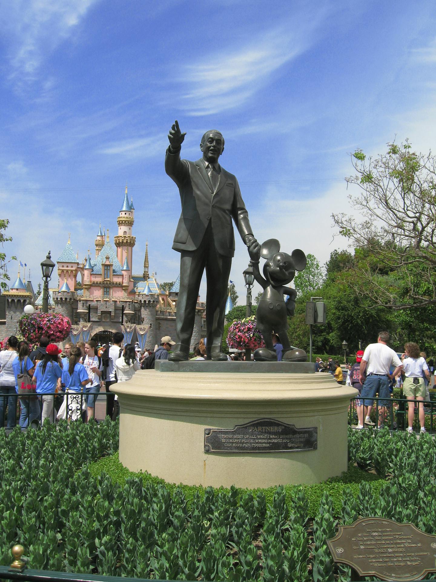 At any age, visitors to Disneyland in Anaheim, California, can appreciate the vision of Walt Disney, seen in this statue holding hands with Mickey Mouse. (Chuck Barney/San Jose Mercury News/MCT) ORG XMIT: 1073703