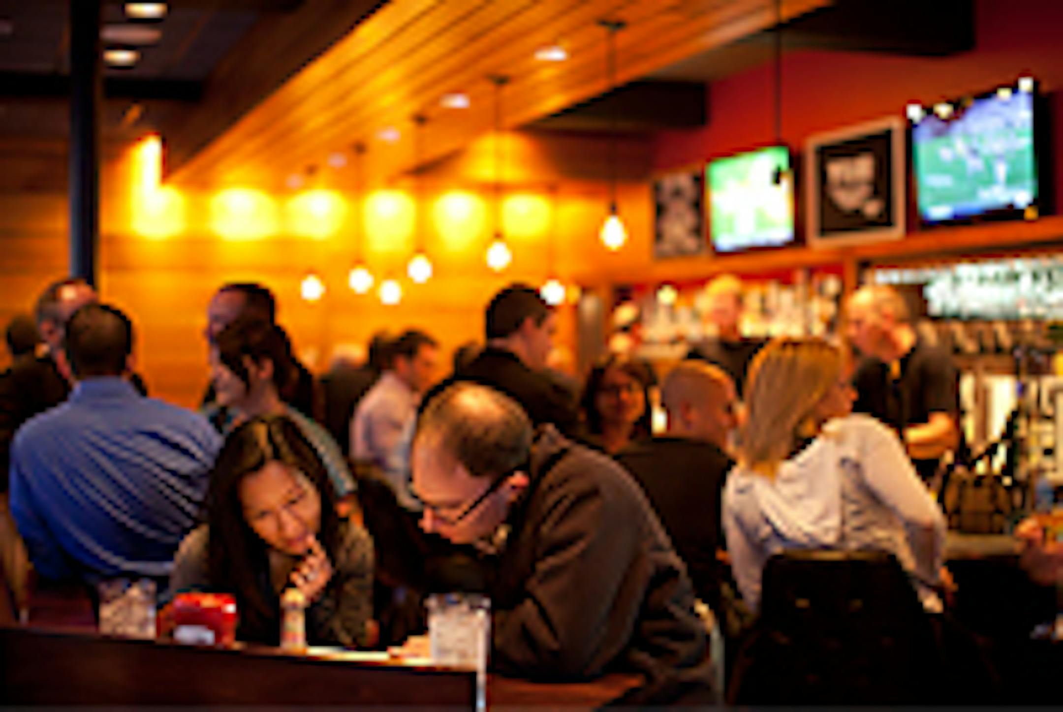 Christine Lim and Sam Schulhofer-Wohl pored over the menu at The Lowry