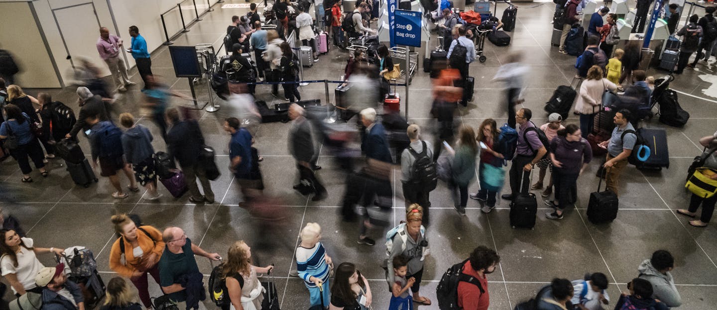 Lines were long right early Monday morning regardless of whether people were headed to the North or South checkpoint.] Everybody without PreCheck goes through one checkpoint at MSP Airport's main terminal starting Monday. That'll make for a crowd at the North checkpoint in the morning, which is a particularly busy time at the airport. The crunch comes because the south checkpoint will be under construction and limited to people with Precheck status. RICHARD TSONG-TAATARII &#xa5; richard.tsong-ta