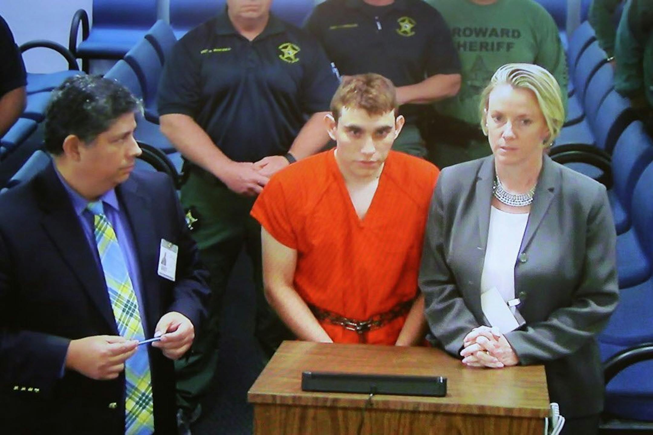 Suspected school shooter Nikolas Cruz makes a video appearance in Broward County court before Judge Kim Theresa Mollica on Thursday, Feb. 15, 2018. Cruz is facing 17 charges of premeditated murder in the mass shooting at Marjory Stoneman Douglas High School in Parkland, Fla.