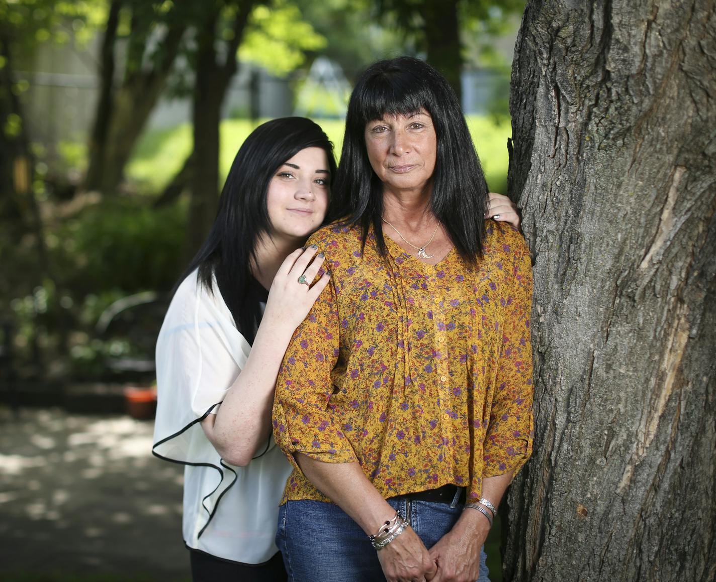 Kelly Krodel, right, has lived symptom-free with Hepatitis C for decades, and was excited when she learned of a drug that could eliminate the virus before it started causing liver problems. Only because she is healthy, two insurers have denied coverage of the $100,000 prescription. She was photographed with her daughter Maddie Krodel at their home in South St. Paul, Minn., on Tuesday, June 2, 2015. Kelly found out she had Hepatitis C soon after her daughter was born. ] RENEE JONES SCHNEIDER &#xe