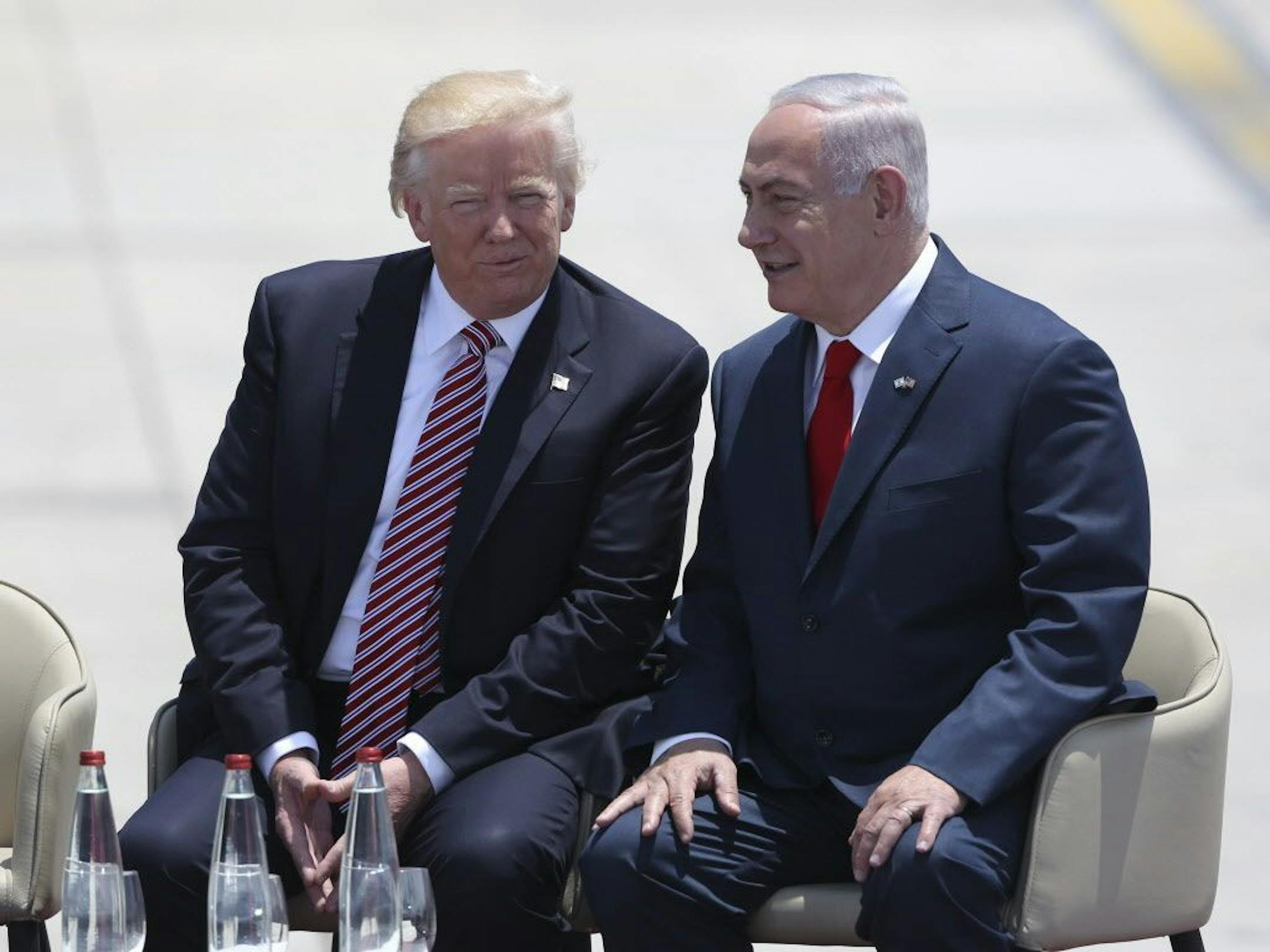President Donald Trump and Israeli Prime Minister Benjamin Netanyahu talk during welcome ceremony in Tel Aviv, Monday, May 22,2017.