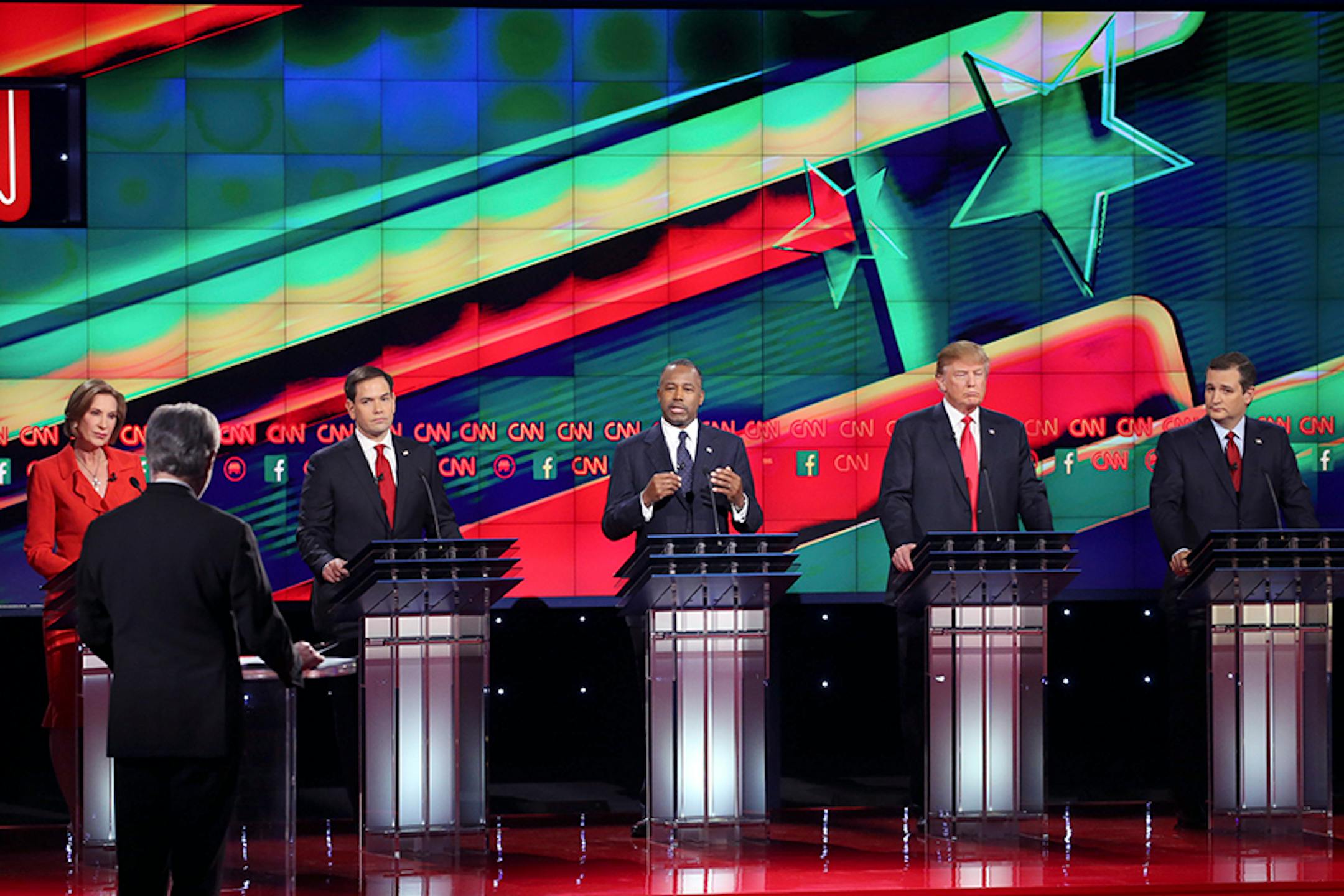 Ben Carson speaks during the debate of Republican presidential hopefuls at the Venetian in Las Vegas, Dec. 15, 2015. Carson asked for a moment of silence for the victims of the San Bernardino mass shooting in his opening statement. From left: Carly Fiorina, CNN anchor Wolf Blitzer, Sen. Marco Rubio, Carson, Donald Trump and Sen. Ted Cruz.