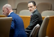 Nicolae Miu, right, in a St. Croix County District courtroom in Hudson on Monday. Miu, 54, of Prior Lake is accused of killing 17-year-old Isaac Schum