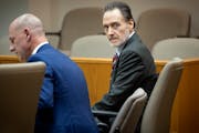 Nicolae Miu, right, in a St. Croix County District courtroom in Hudson on Monday. Miu, 54, of Prior Lake is accused of killing 17-year-old Isaac Schum