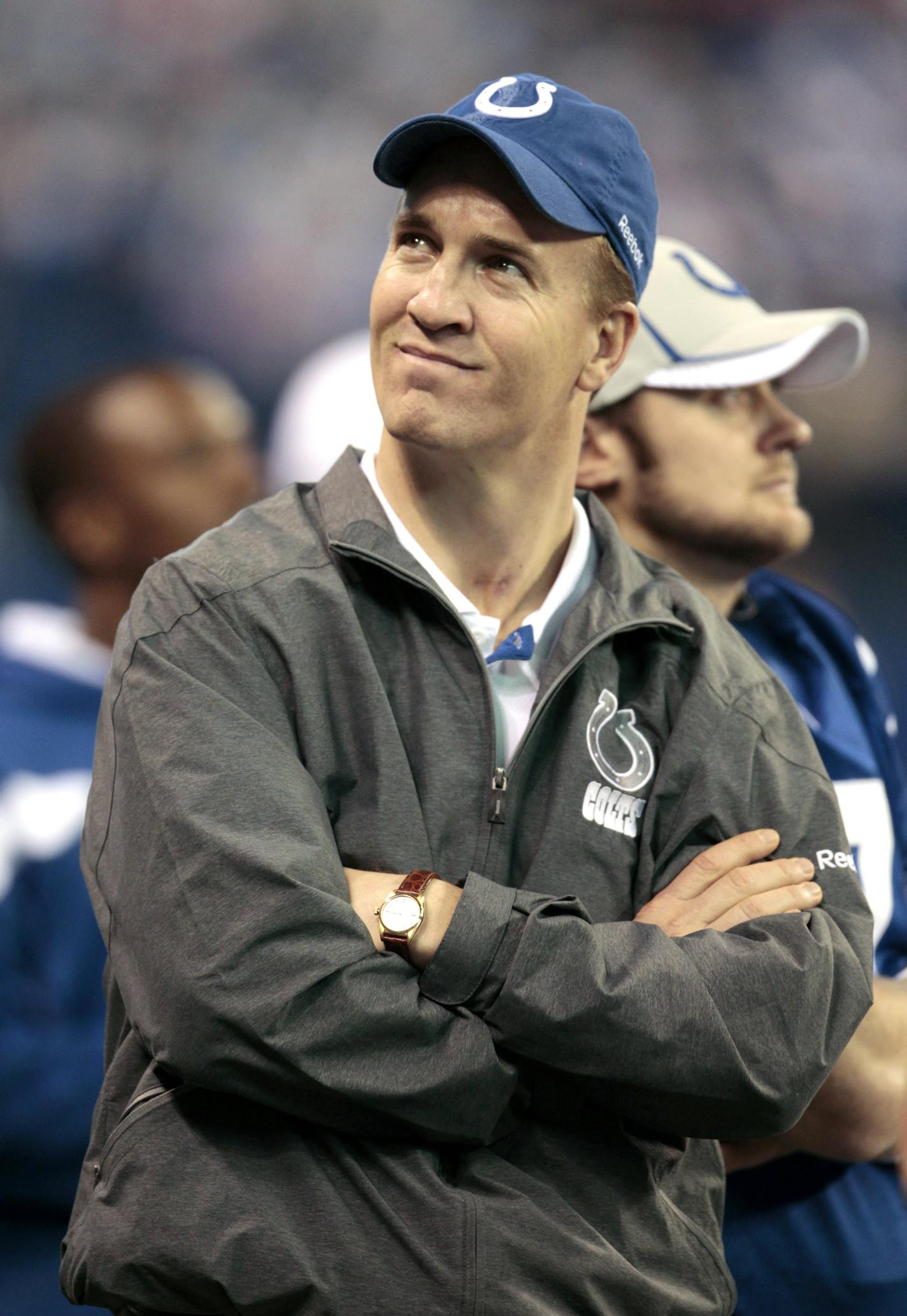 Indianapolis Colts quarterback Peyton Manning looks on during the fourth quarter of an NFL football game against the Tennessee Titans in Indianapolis, Sunday, Dec. 18, 2011. Colts vice chairman Bill Polian said Manning will not return to play in the final two games of the season, but the franchise quarterback did take snaps from center Jeff Saturday this week. The Colts defeated the Titans 27-13. (AP Photo/Darron Cummings)