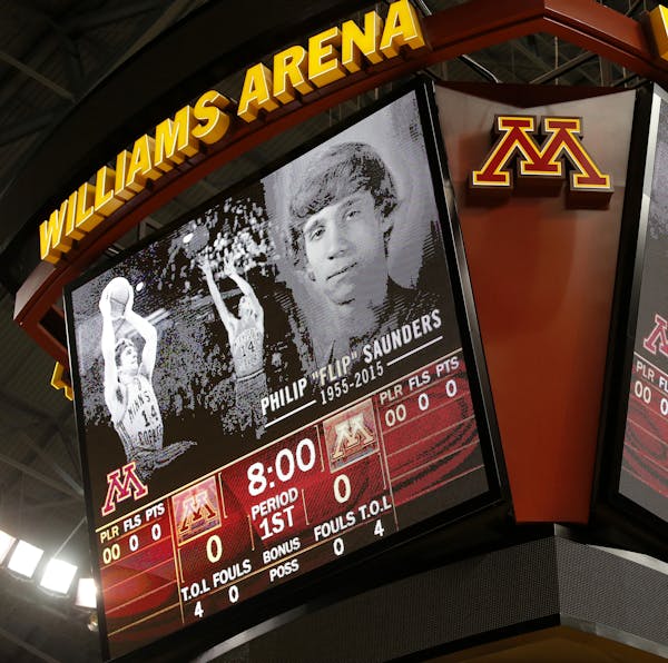 A moment of silence was observed at Williams Arena before a team scrimmage after news of the passing of former Gophers player Flip Saunders. ] CARLOS 