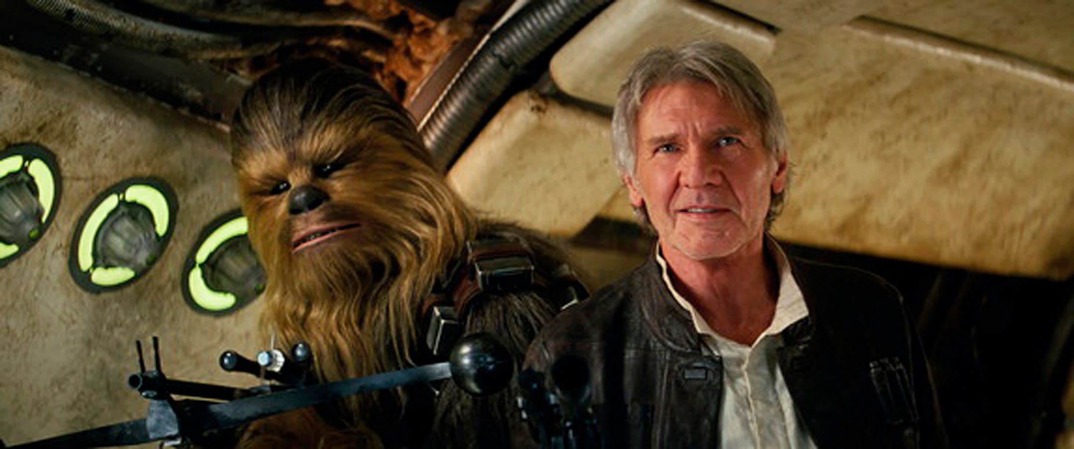 This photo provided by Lucasfilm shows Peter Mayhew as Chewbacca and Harrison Ford as Han Solo in "Star Wars: The Force Awakens." Early screenings of the film begin Thursday night, Dec. 17, 2015. (Film Frame/Lucasfilm via AP) -
