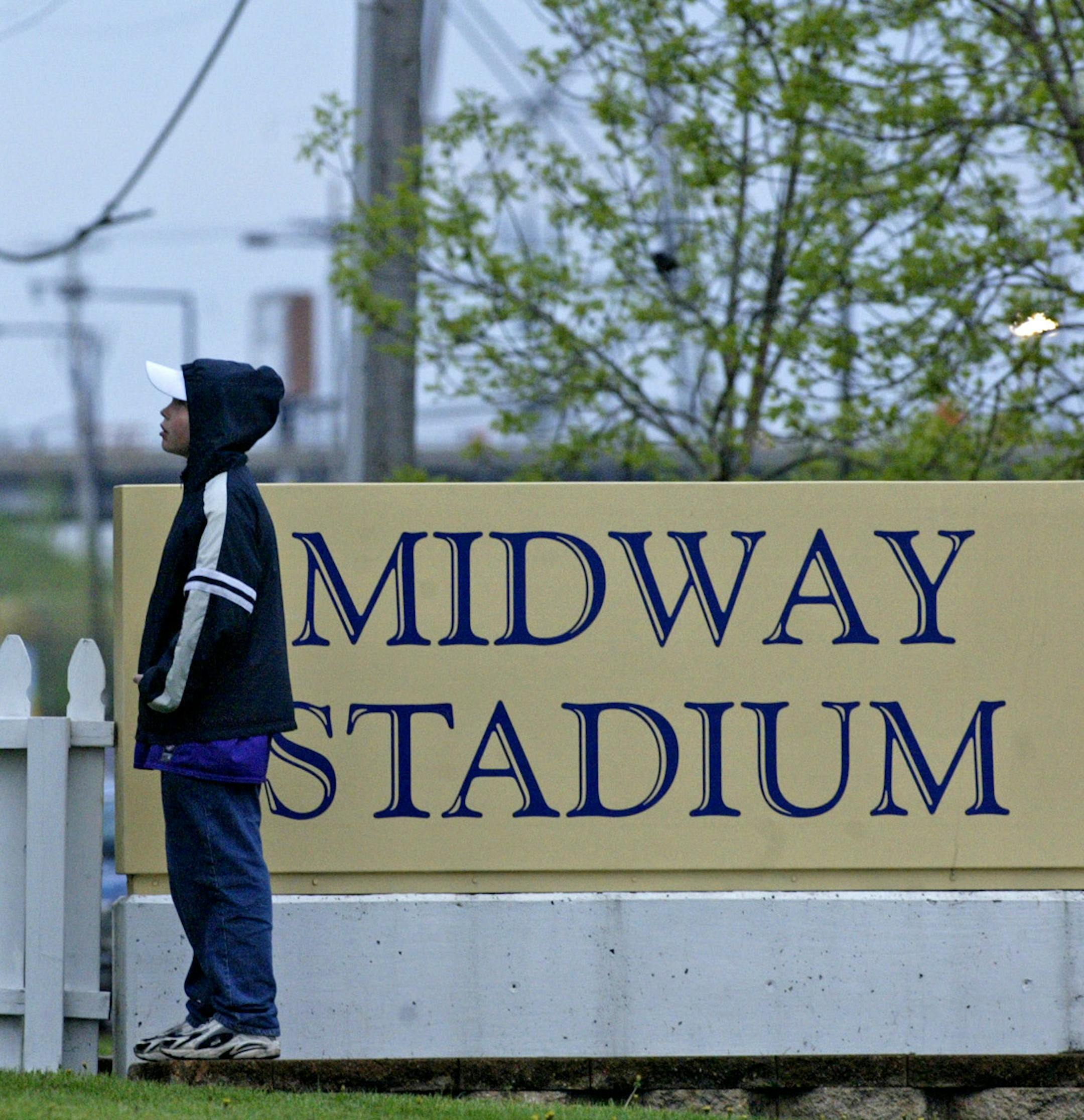 Marlin Levison - Strib 05/08/05 - Assign#95921 - The Saints baseball club played a game against the Sioux Falls Canaries at 5:30 am Sunday morning, making it the earliest starting time for a professional baseball game ever. Fans were allowed to pitch their tents on the outfield grass the night before in preparation for the early start time. Several thousand fans showed up for the early game.
IN THIS PHOTO: It may have been 6:30 a.m., but Brian Kill, 10 of Blaine was ready to shag any foul balls