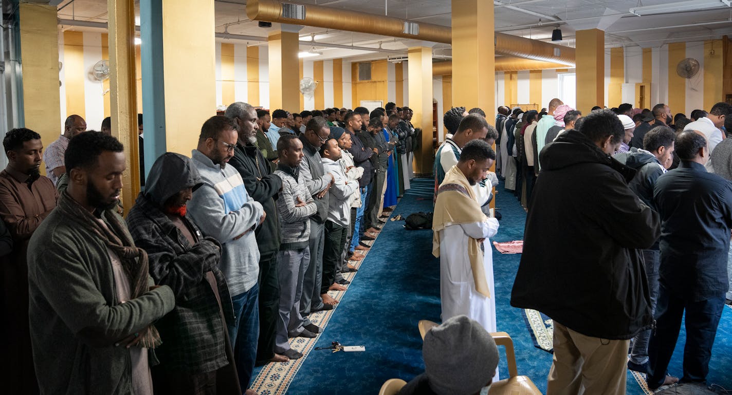 Men participate in Friday prayers at Masjid Omar Islamic Center on Friday, April 28, 2023 in Minneapolis, Minn. ] LEILA NAVIDI • leila.navidi@startribune.com